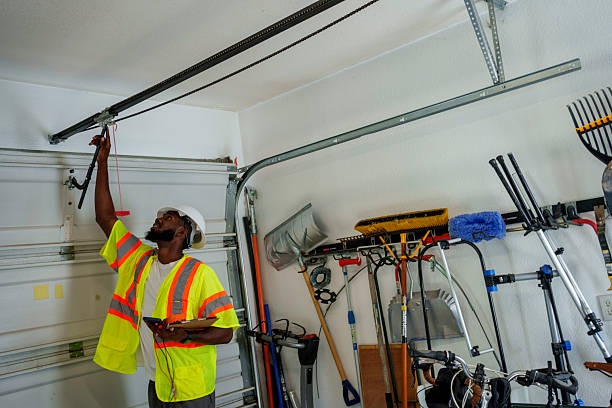 Professional Garage Door Panel Replacement technician working in Strawberry Point, IA
